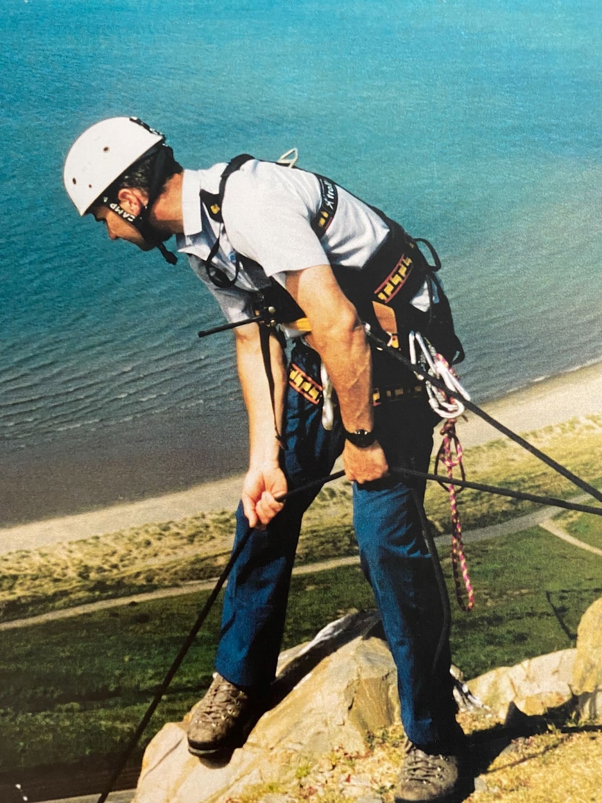 RSPCA inspector Tim Jones abseiled down a cliff after a juvenile raven.