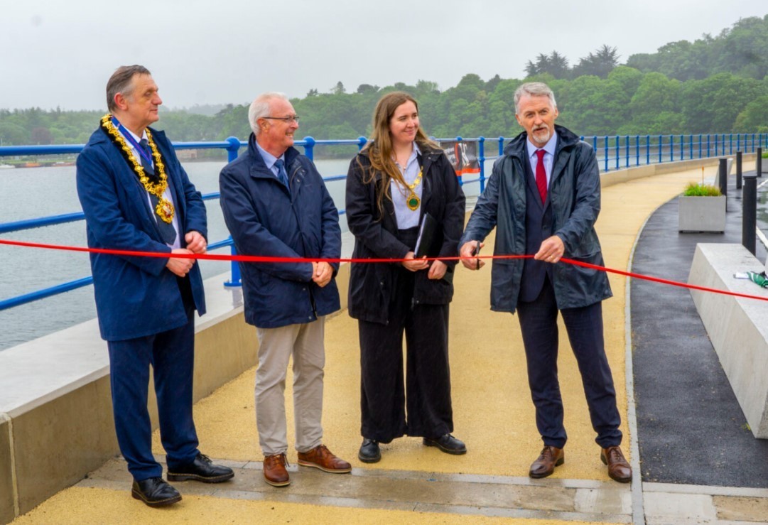 Pictured: Welsh Government Cabinet Secretary for Climate Change and Rural Affairs, Huw Irranca-Davies cutting the ribbon on the new defences, with Councillor Beca Roberts, Chair of Cyngor Gwynedd; Councillor Medwyn Hughes, former Chair of Gwynedd Cou