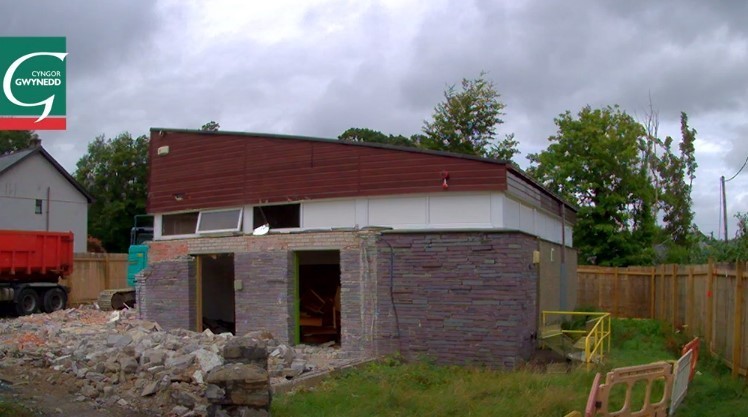 Screen Grab - from the You Tube video by Cyngor Gwynedd showing the clearance of the old library site in Llanberis so that three affordable homes could be built - the first In 30 Years by the council